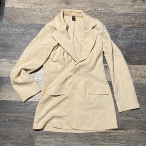Cream shoulder padded blazer with button ups